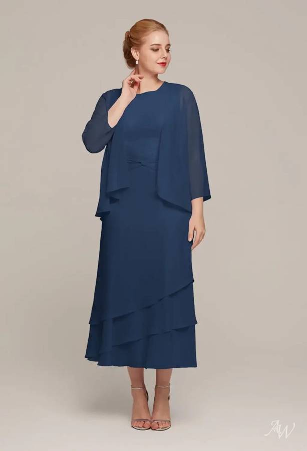 A navy tea-length mother-of-the-bride dress with a sheer chiffon jacket