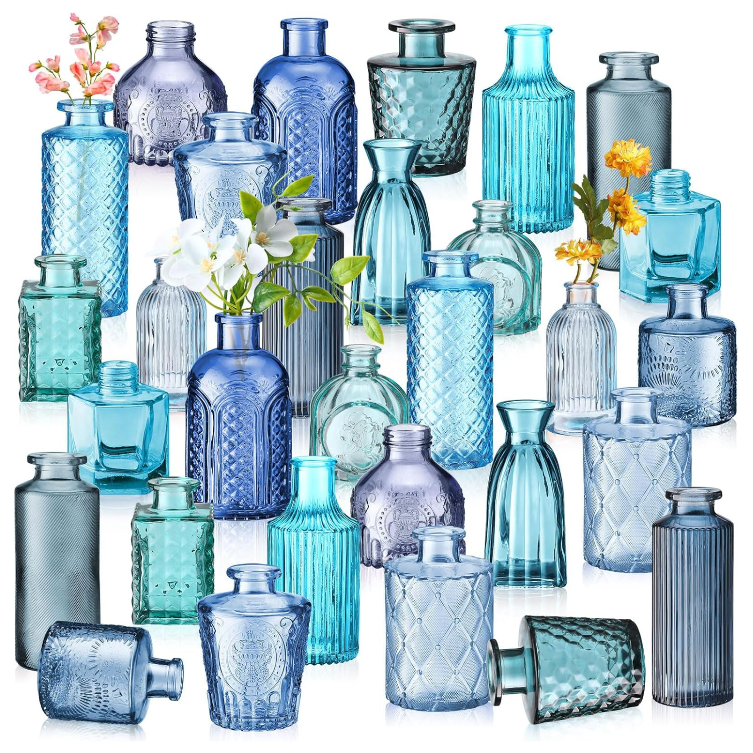 blue glass bud vases of varying shades and shapes