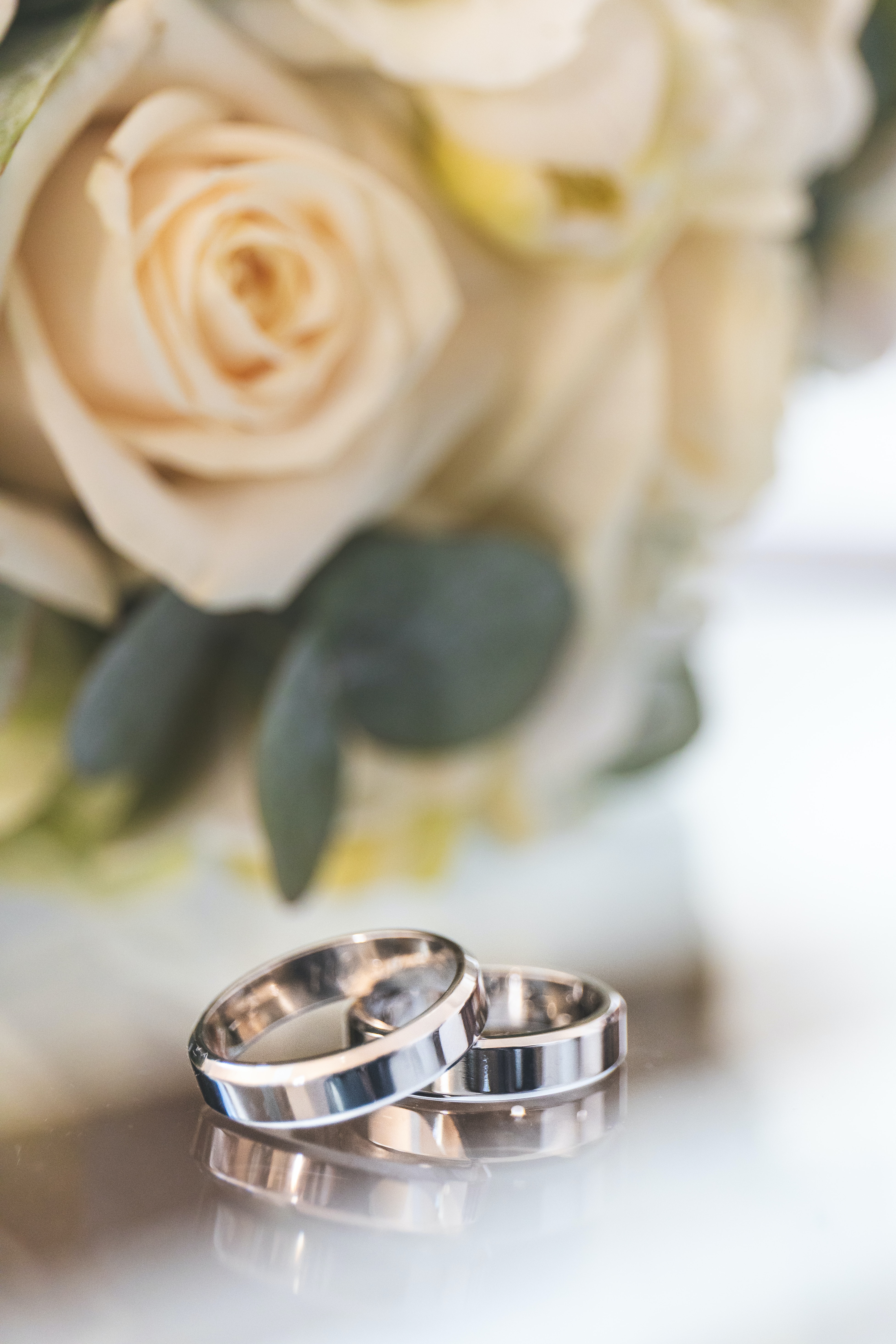 Wedding rings placed together symbolizing the exchange of rings during a wedding ceremony