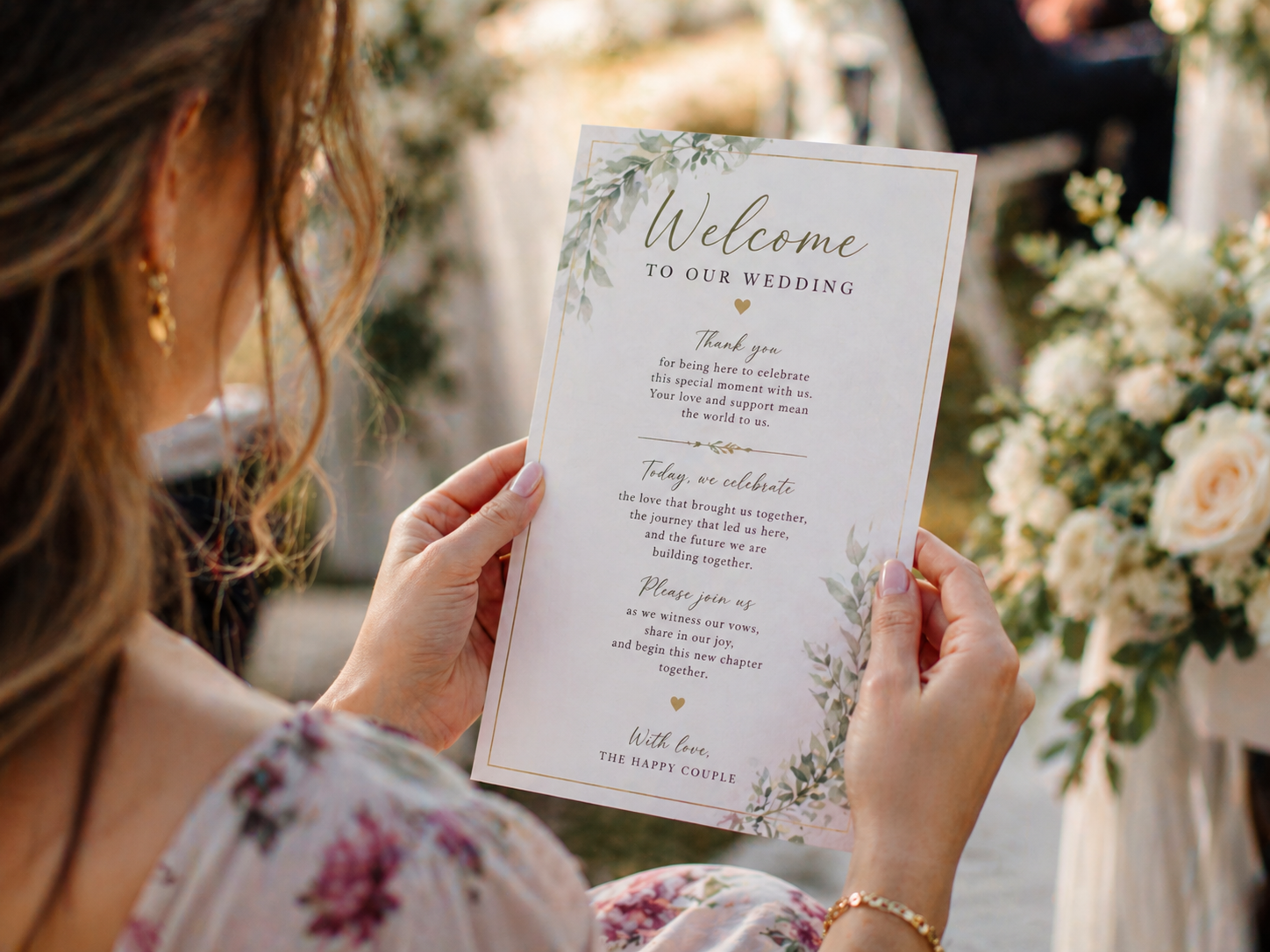 guest holding wedding welcome card with message for ceremony guests